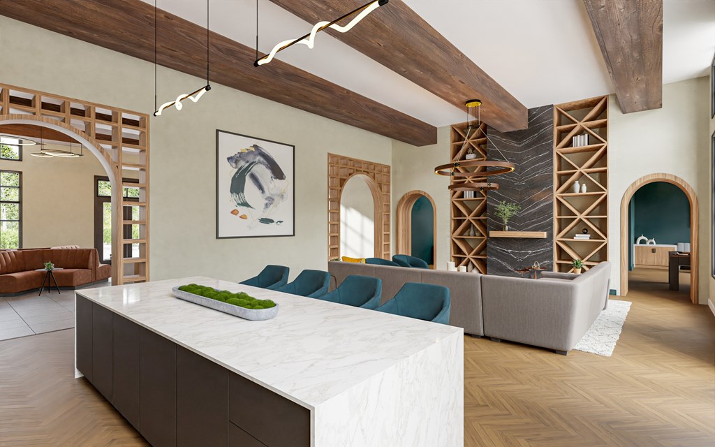 a large dining room with a large white table and chairs