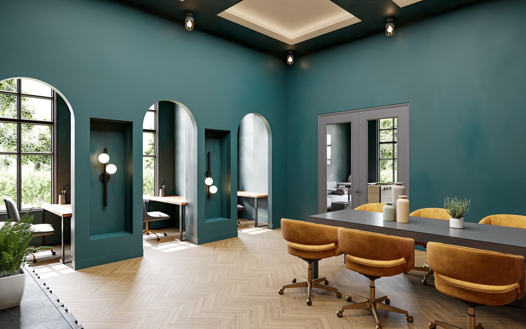 a conference room with blue walls and a table and chairs