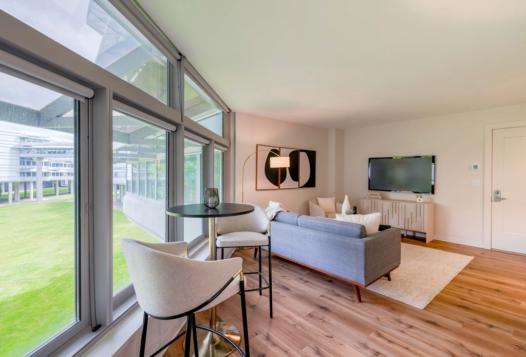 a living room with a couch and a table