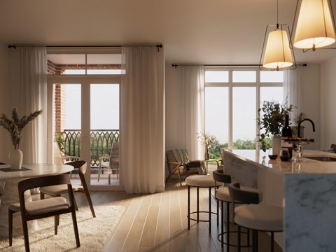 A modern kitchen with a bar area and a dining table with chairs.