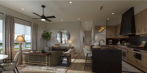 A modern kitchen with a black countertop and a ceiling fan.