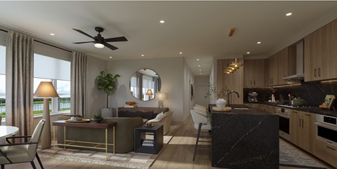 A modern living room with a kitchen area in the background.