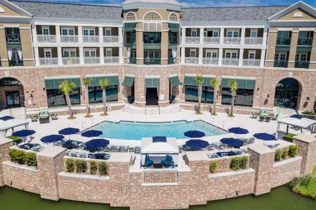 an aerial view of the pool at the resort at longboat key club