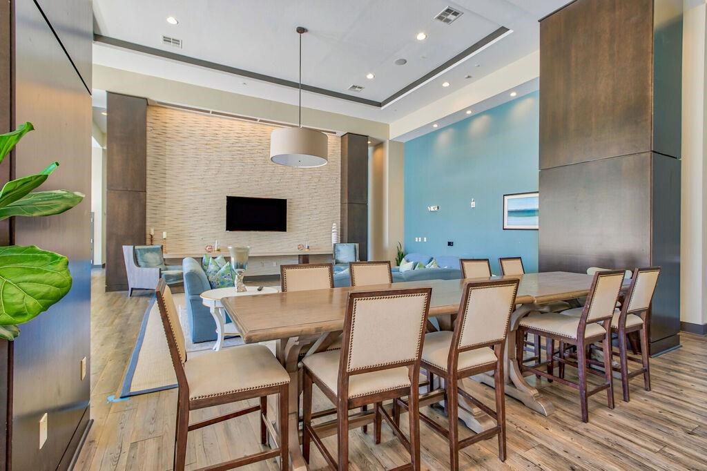 a dining room with a table and chairs