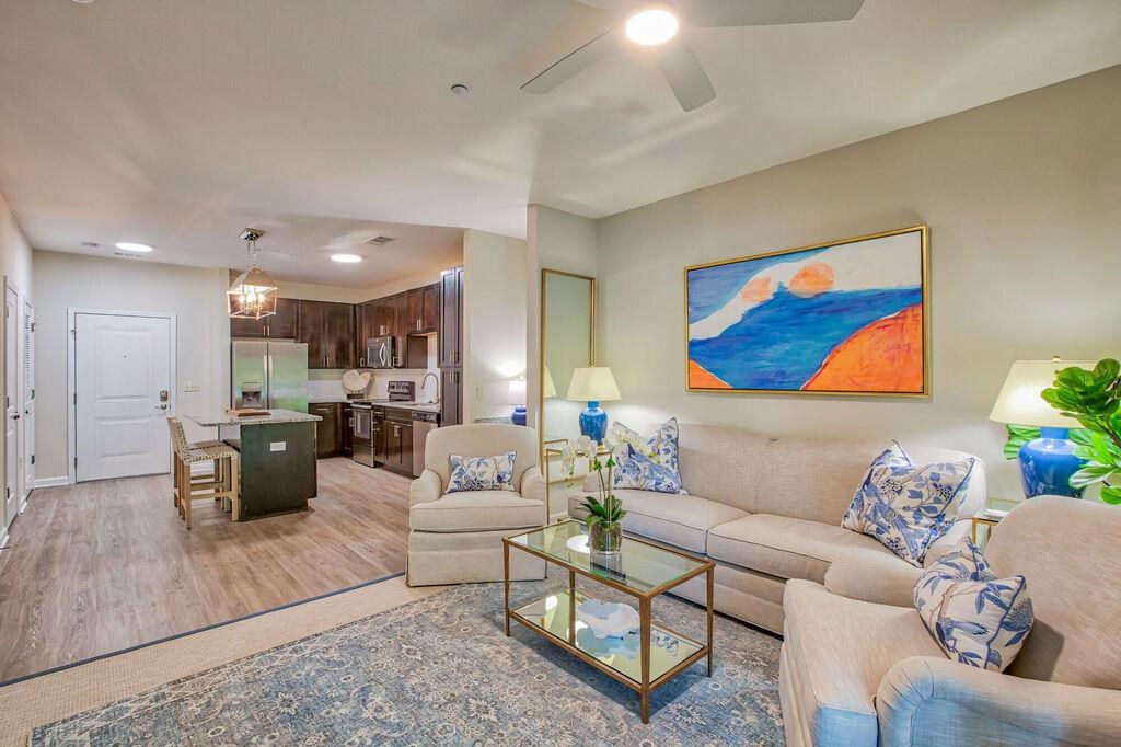 a living room with a couch and a table