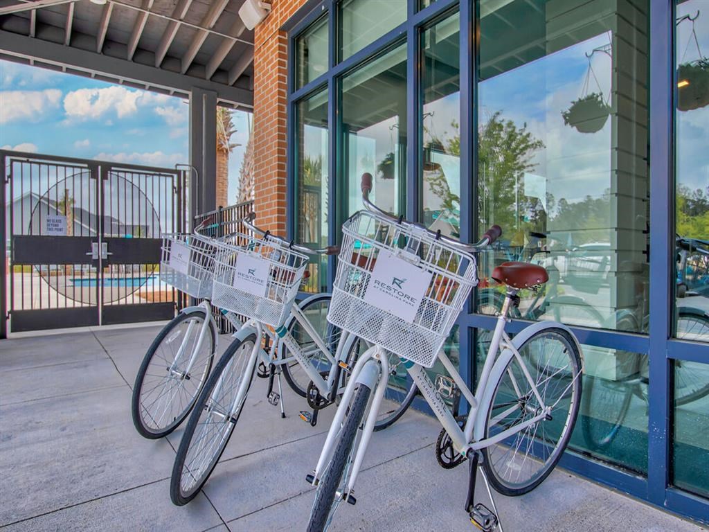 three bikes parked in front of a building