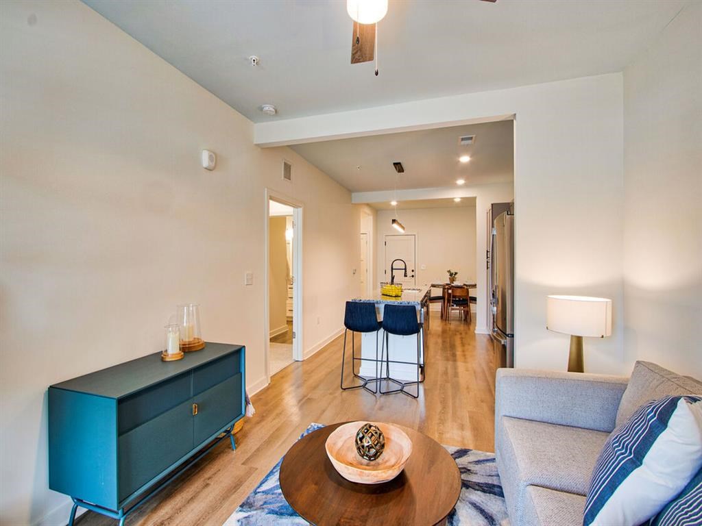 a living room with a couch and a table