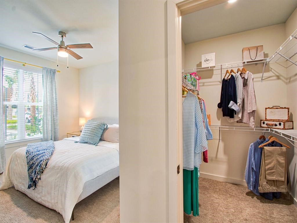 a bedroom with a bed and a closet