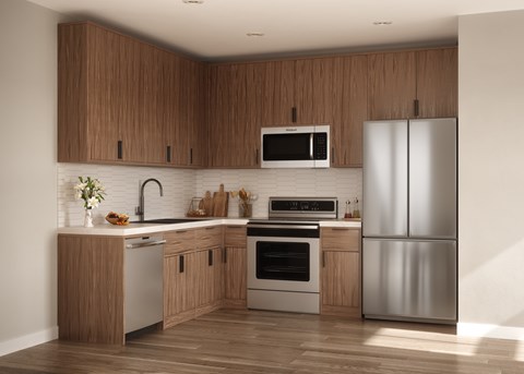 A modern kitchen with wooden cabinets and stainless steel appliances.