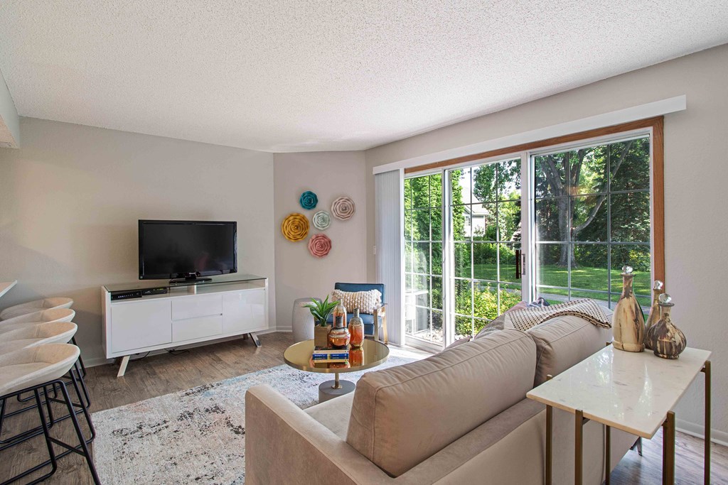 Living room model with sliding glass door access to outside