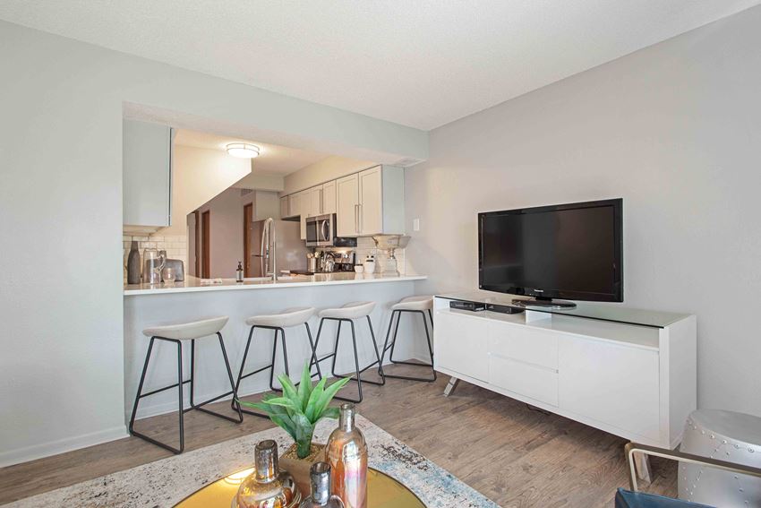 Model home view of the upgraded kitchen from the living room - Photo Gallery