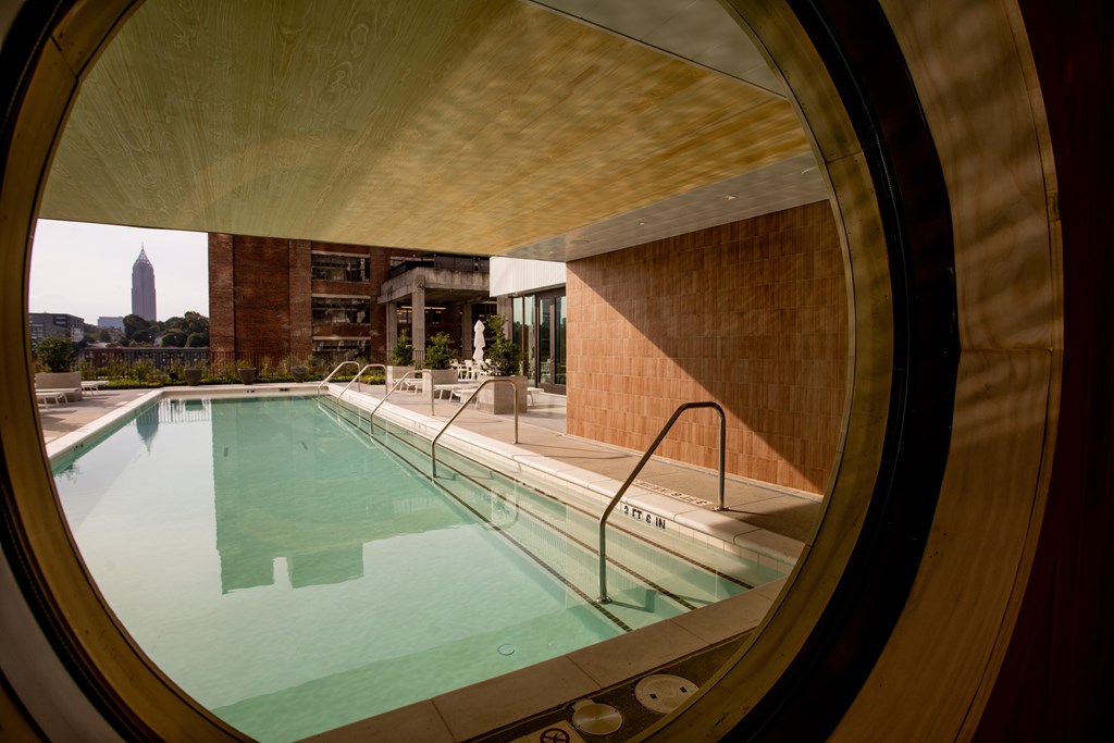 a swimming pool with a view of the empire state building