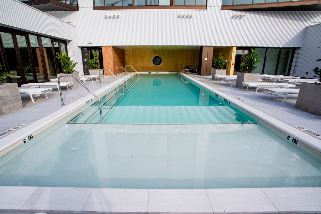 a swimming pool in the lobby of a hotel