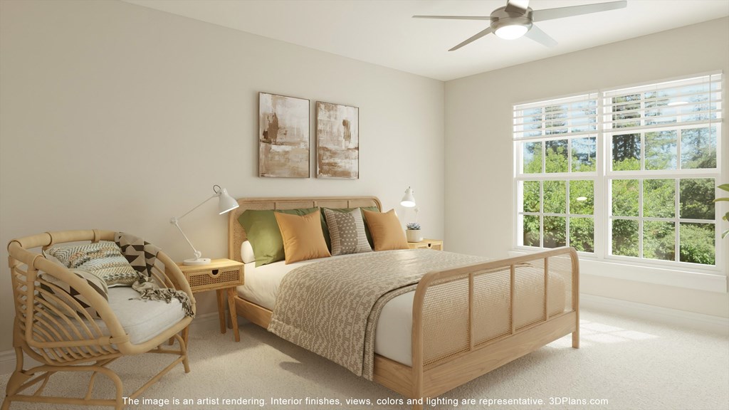 a bedroom with a bed and a chair and a ceiling fan