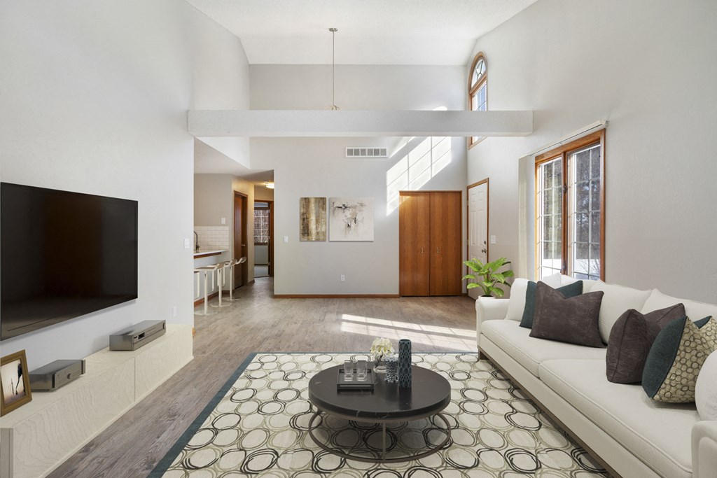 View from living room to kitchen in single story towhome