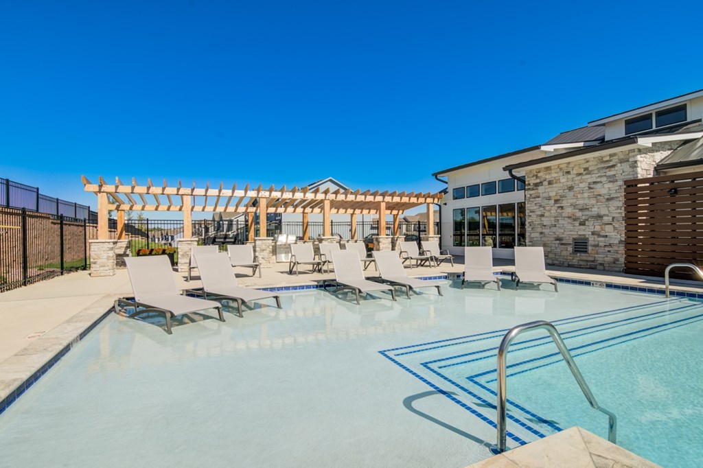 Resort-Style Pool Deck with Lounge Area & Grilling Station