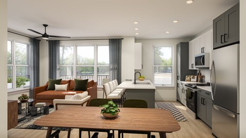 A modern kitchen with a wooden table and a refrigerator on the right side.