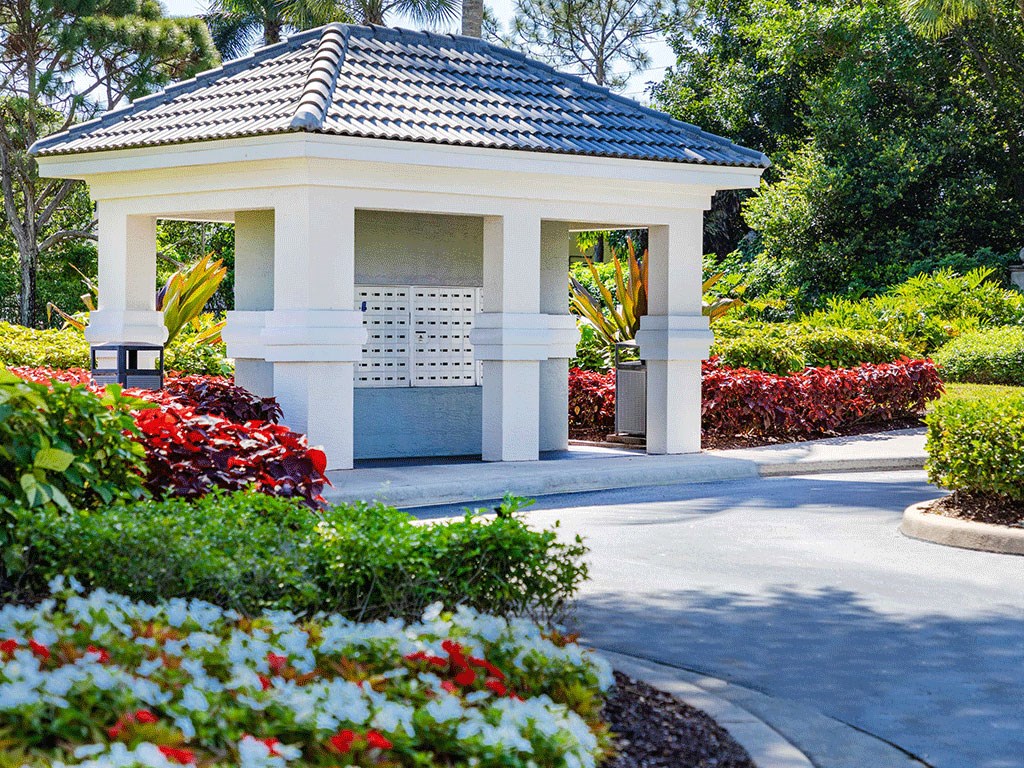 a gazebo in the middle of a garden