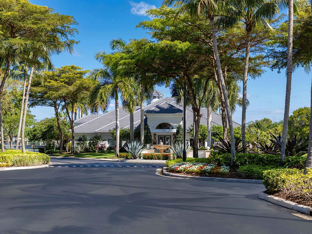 a house with palm trees in front of it