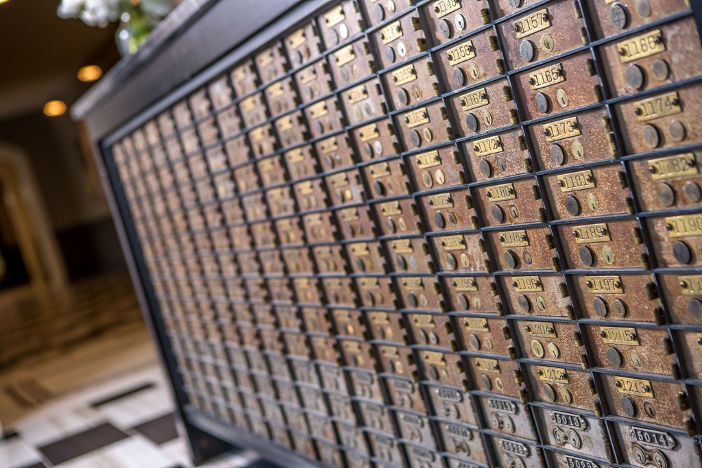 a wall of numbers in the lobby of a building