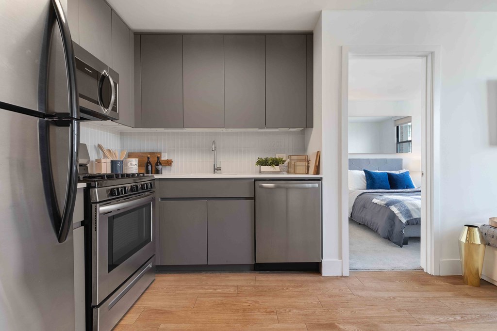 Upgraded kitchen with a sneak peek into the bedroom