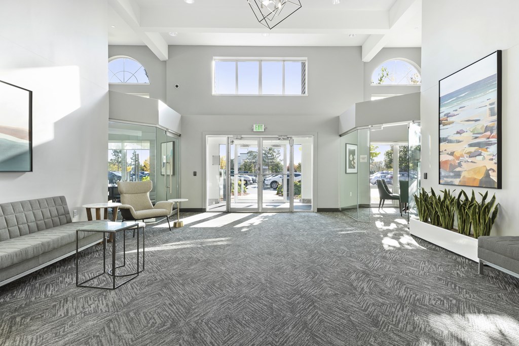 a living room with a couch and a table