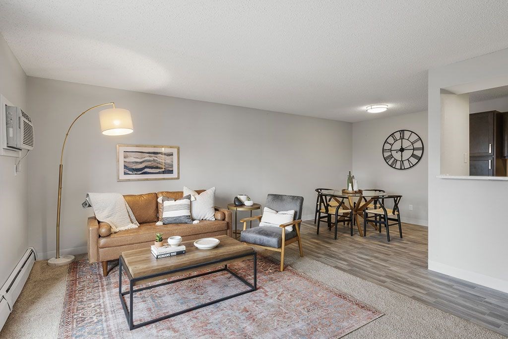 a living room with a couch and a table