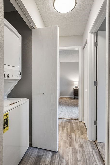 a laundry room with a washer and dryer