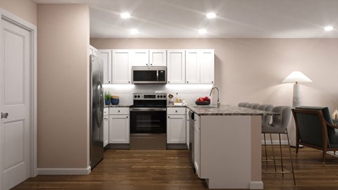 A modern kitchen with a refrigerator, oven, microwave, and bar stools.