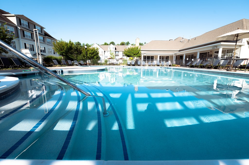View of Pool and Clubhouse Exterior. The Cascades at Tinton Falls, Tinton Falls NJ 07753