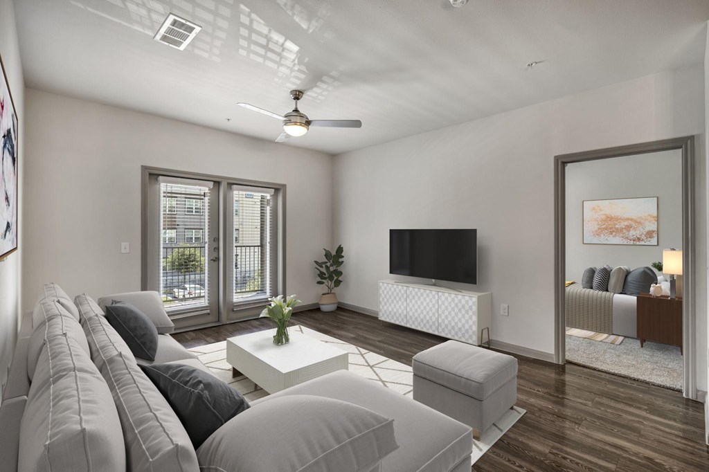 a living room with a couch and a tv