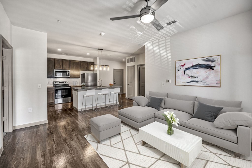 a living room with a couch and a table