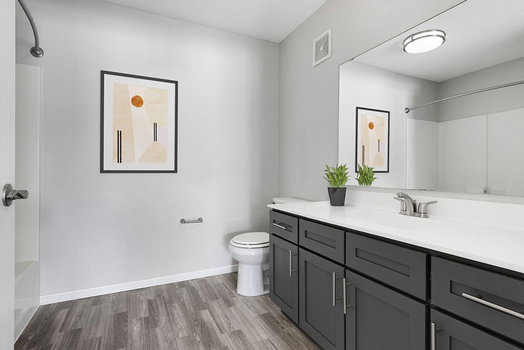 an empty bathroom with a toilet and a sink