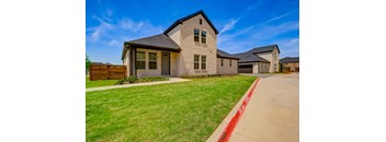 This spacious 2 bedroom 2 bathroom home features hardwood-style flooring, stainless steel appliances, and an attached two-car garage.in willow park texas, build to rent, homes for rent in Willow park, professionally managed rental home community, private yards, low maintenance, pet-friendly.