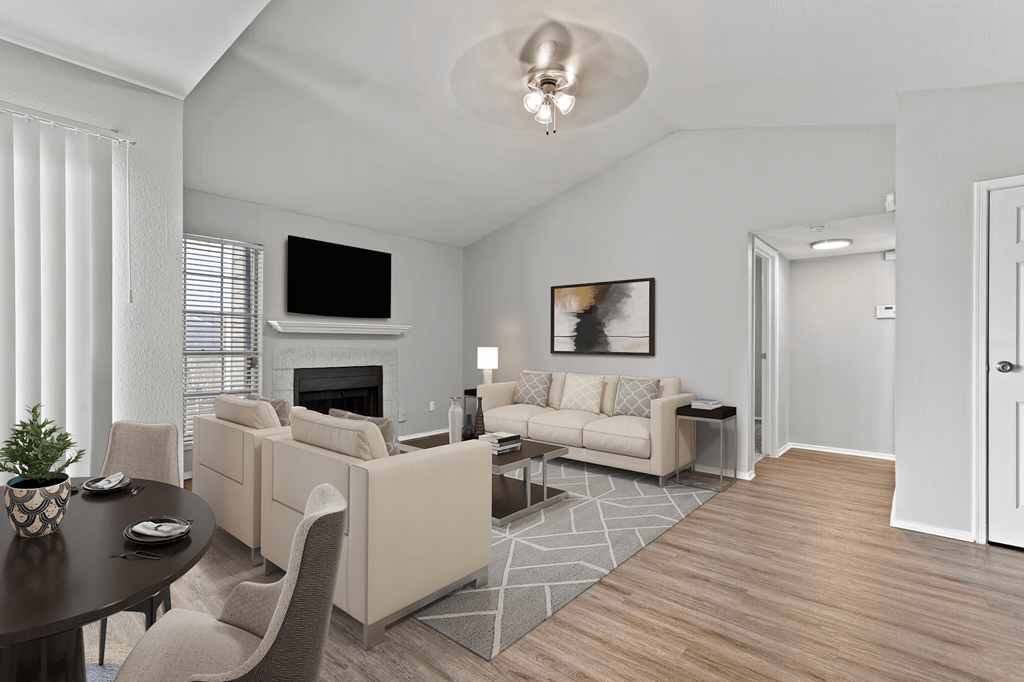 a living room with couches and a table