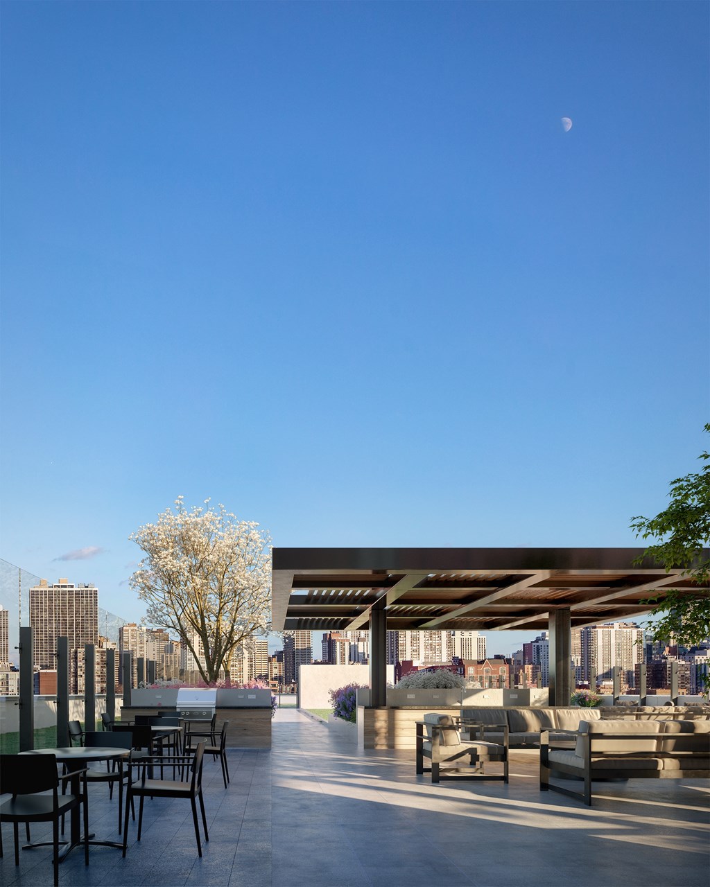 Three BR Apartments in Old Town, IL - North + Vine - Rooftop Grill Area with BBQ, Patio Furniture, and Tables with Chairs.