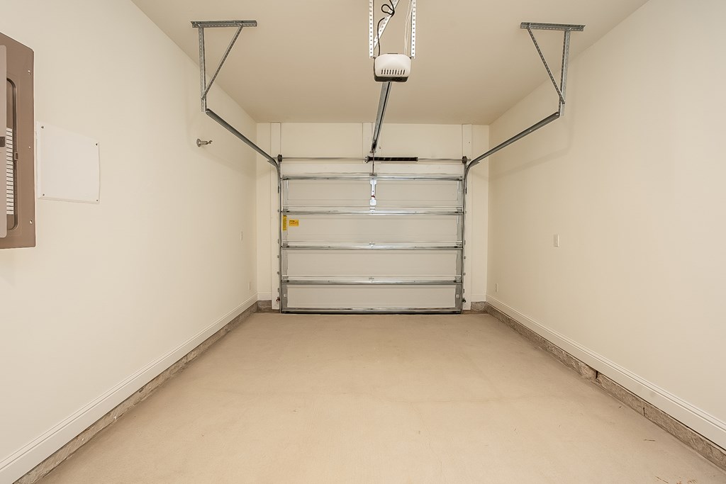 a empty garage with empty shelves on the wall