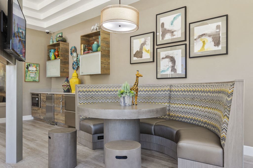 Booth seating with television on wall