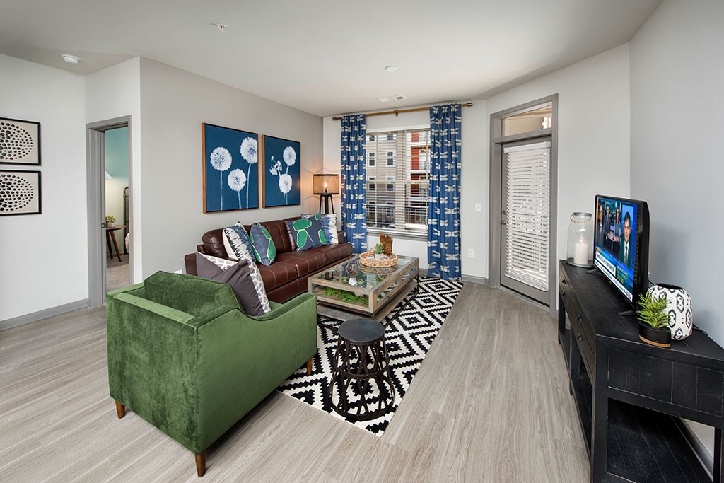 a living room with a couch and a tv