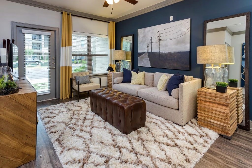 a living room with a couch and a table