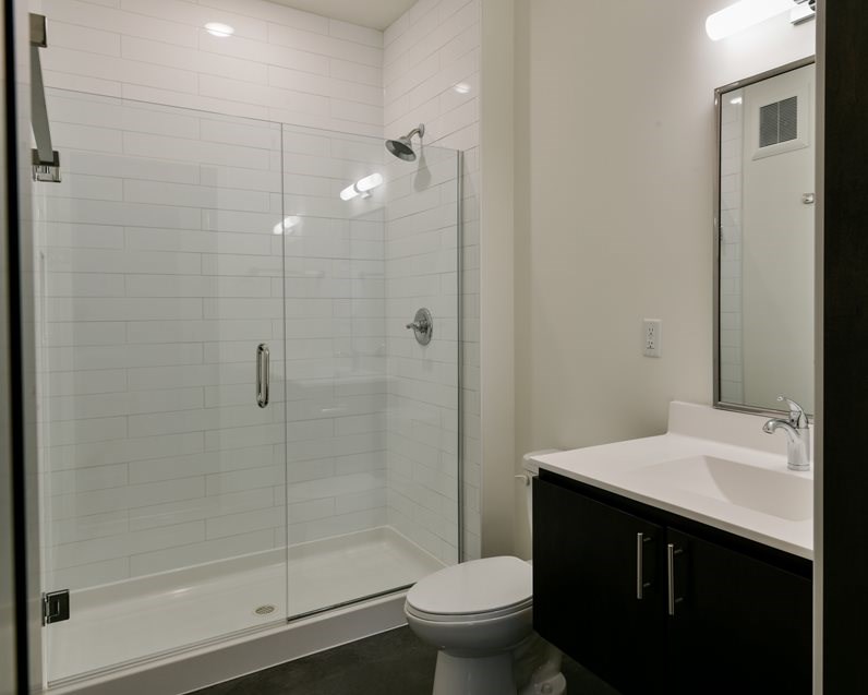 Bathroom with glass enclosed shower