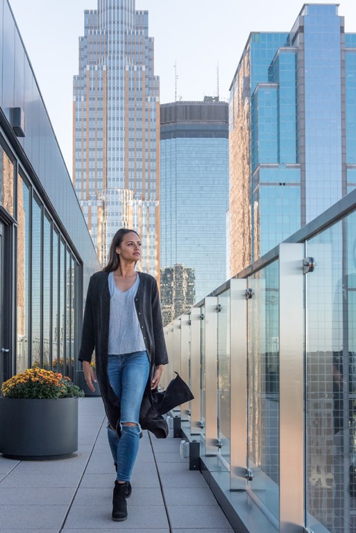 Girl walking on 365 Nicollet balcony