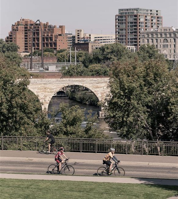 Bikers with city view in background
