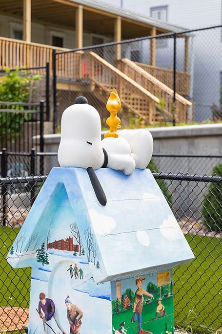 snoopy on a birdhouse
