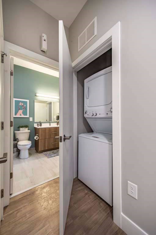 In-unit washer/dryer in closet next to bathroom