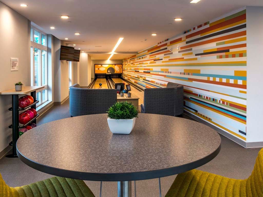 Bowling alley with table and chairs
