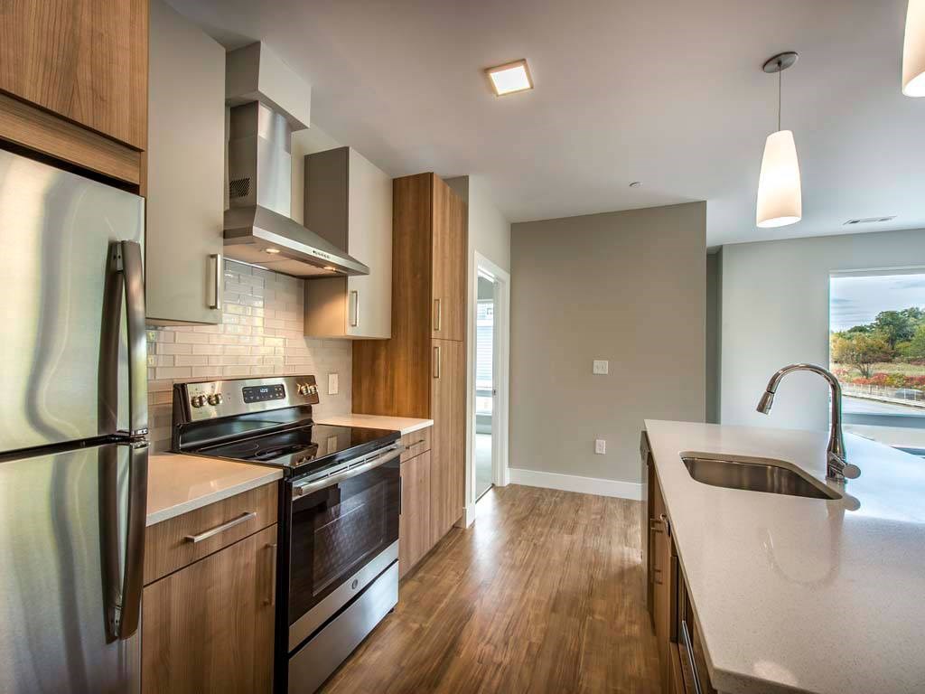 Kitchen with stainless steel appliances, large island and ample cabinet space