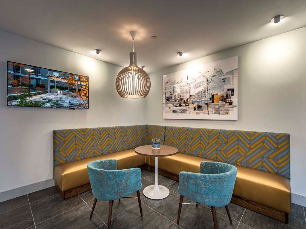 Corner bench seating with small table and chairs