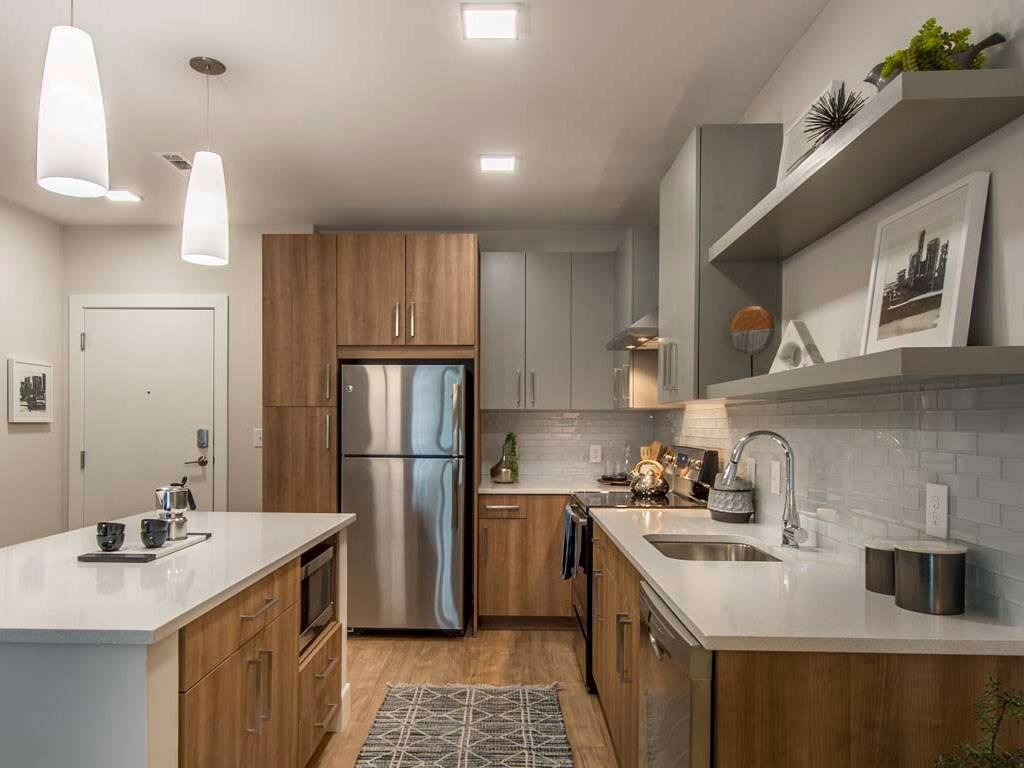 Kitchen with stainless steel appliances, large island and ample cabinet space