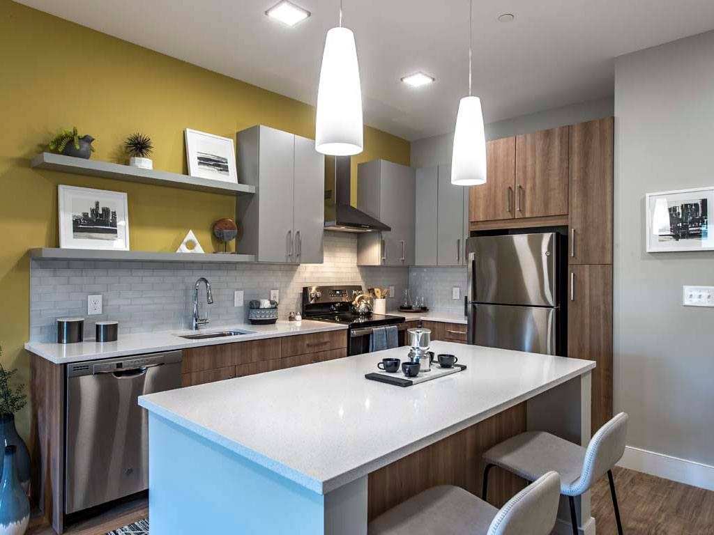 Kitchen with stainless steel appliances, large island and ample cabinet space